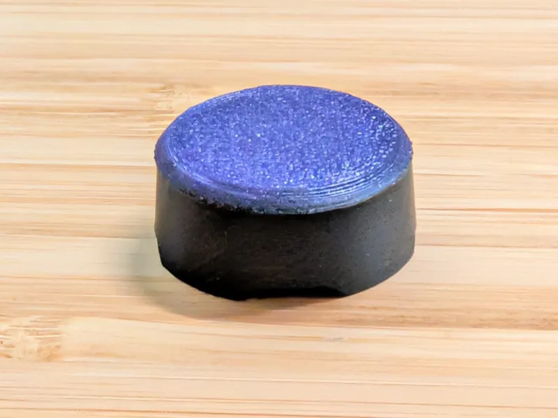 Sworl button cap