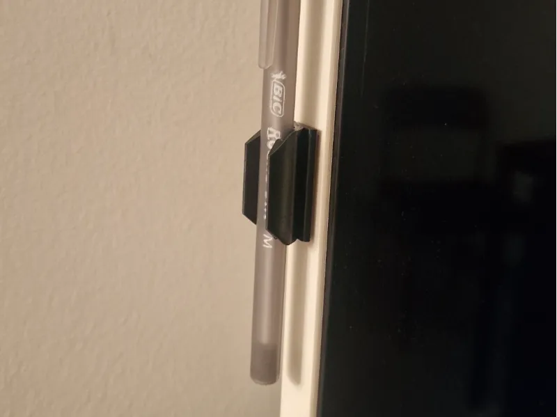 Adhesive pen holder, minimalistic pen stand.