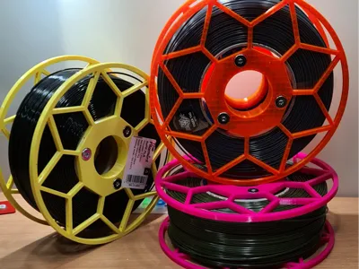 Universal spool for refill filament