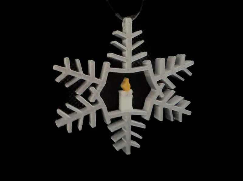 Candle in snowflake ornament