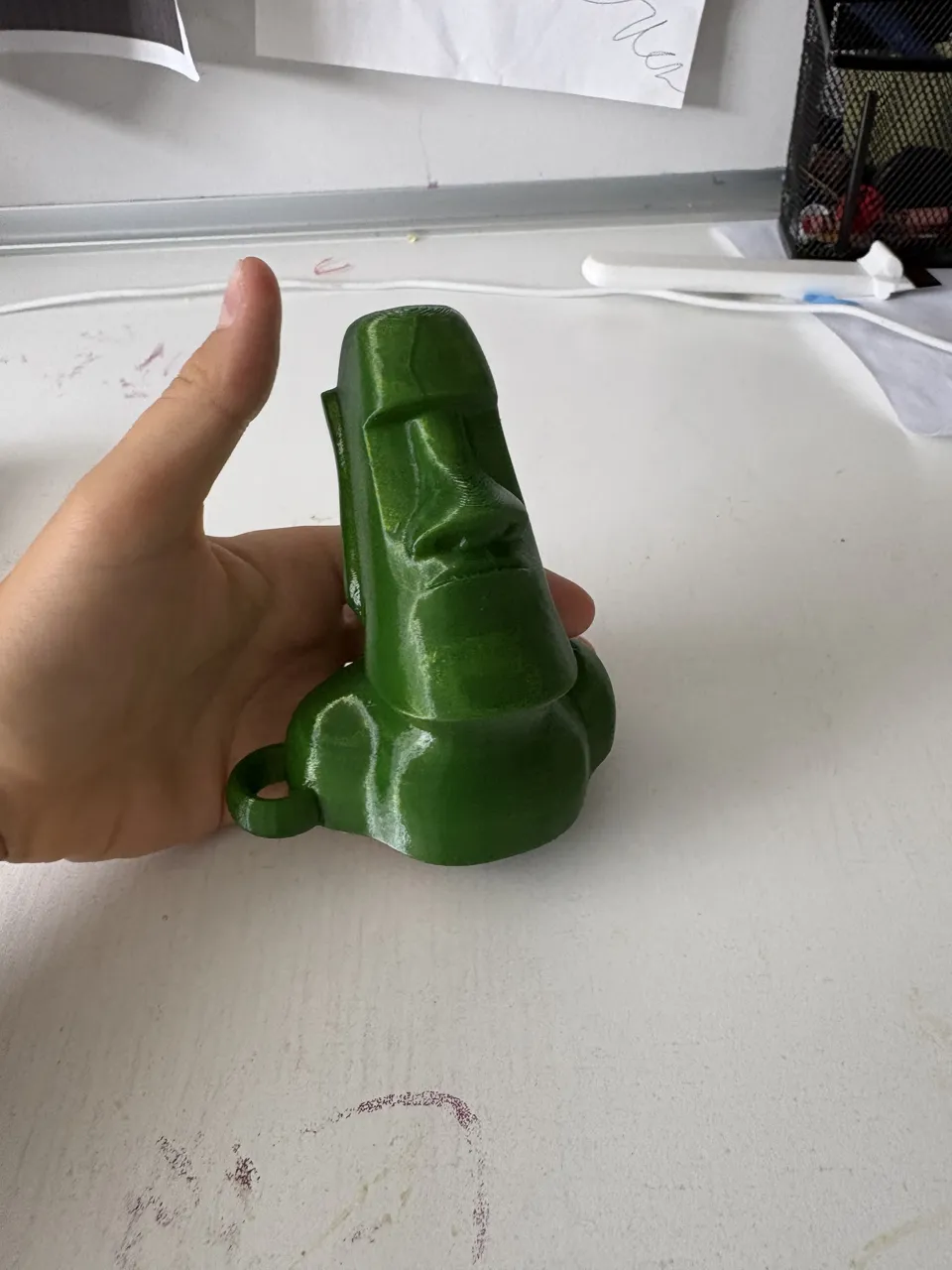 Moai Keychain with printer "poop" trash view 2