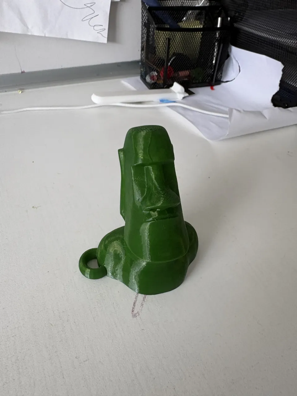 Moai Keychain with printer "poop" trash view 3