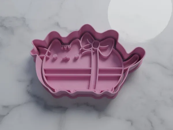 Emporte-pièce Pusheen avec nœud cadeau