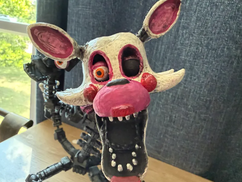 Mangel action figure
