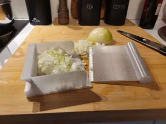 Kitchen scoop with scraper