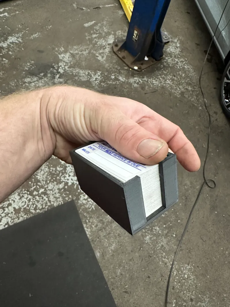 Oil change sticker holder