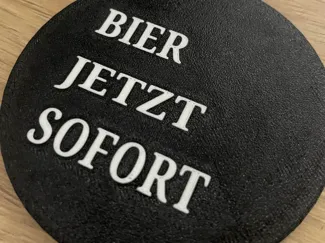 Untersetzer mit dem Schriftzug Bier Jetzt Sofort
