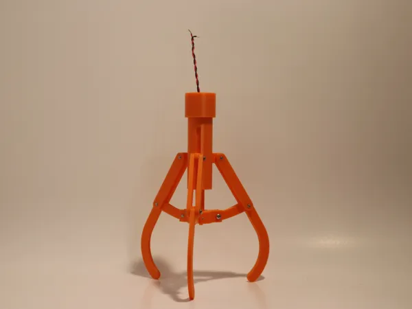 Pince mécanique articulée type distributeur de peluches