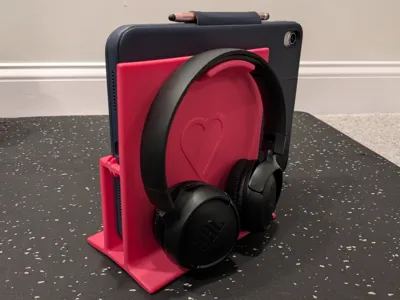 Tablet and headphone stand with cable holders