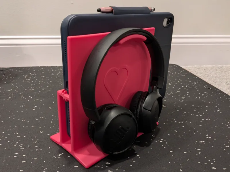 Tablet and headphone stand with cable holders
