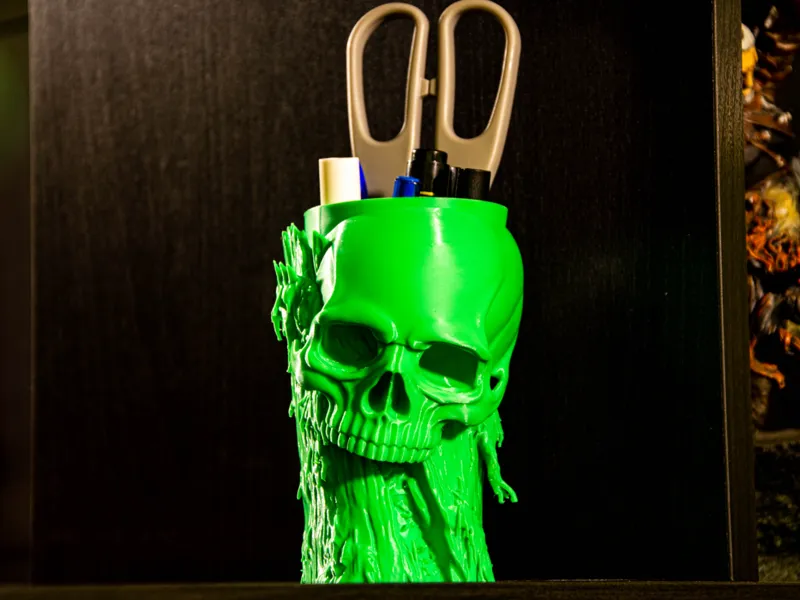 Skull ingrown into tree trunk - penholder