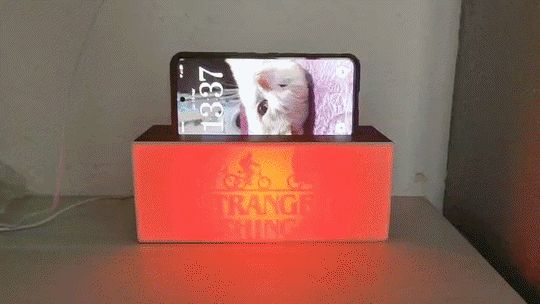 Atmospheric night lamp with cell phone holder