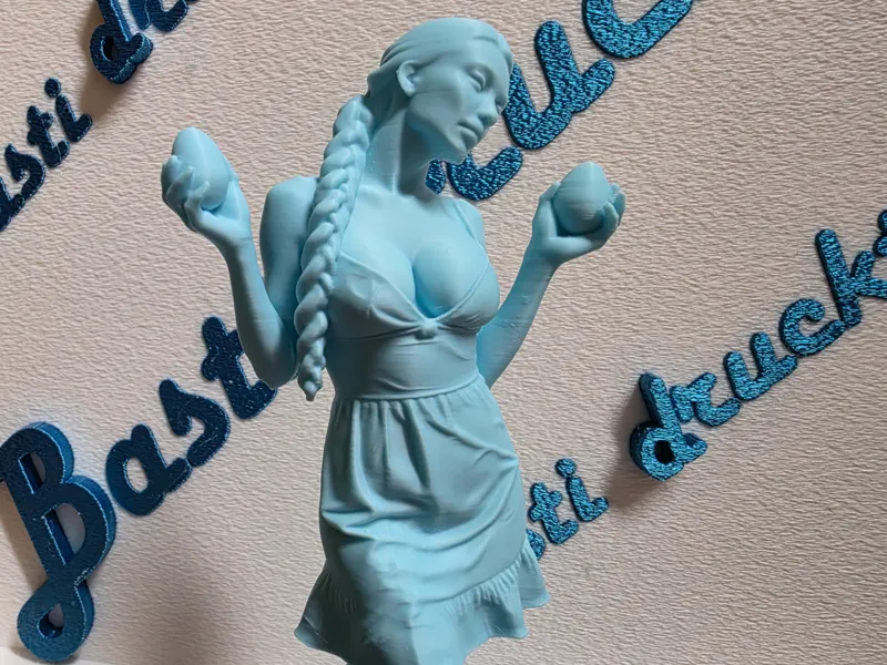 Woman in summer dress holding Easter egg
