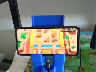 Phone holder and USB cable holder support