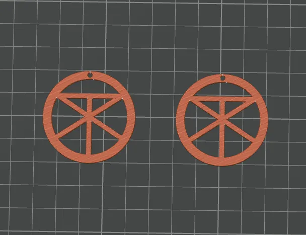 The Rasmus logo earrings/keychain view 2