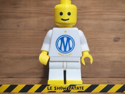 brick man with the new OM logo