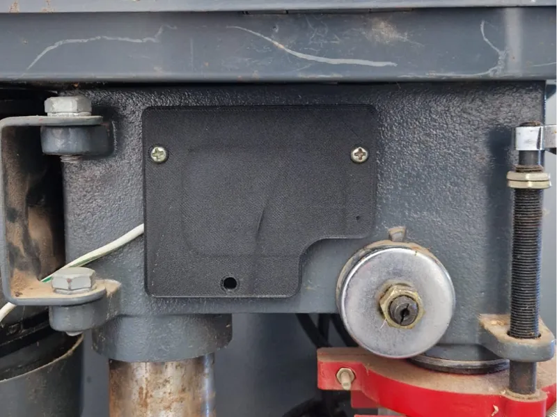Cover for electronics box on column drill