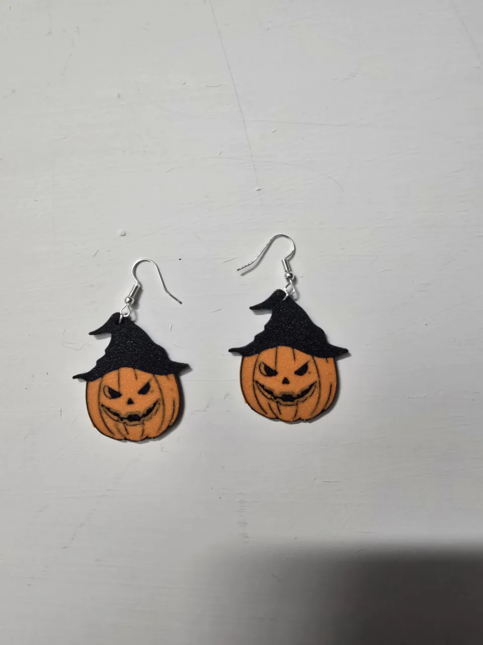 Halloween pumpkin with witch hat earring view 2
