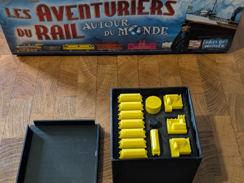 Boite de rangement pions aventurier du rail