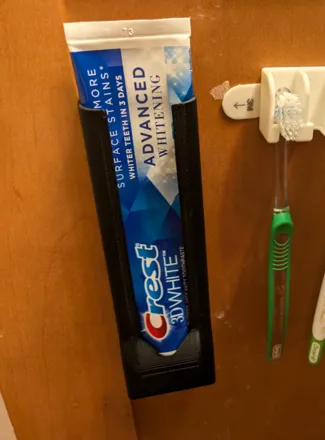 Toothpaste Holder for cabinet door