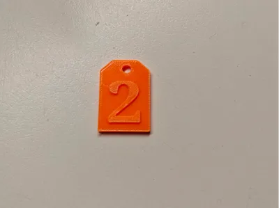 Number 2, sign/card with hole for hanging