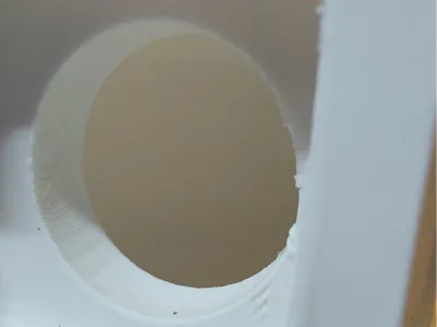 OnePlus Watch 2 charger stand with pushing hole