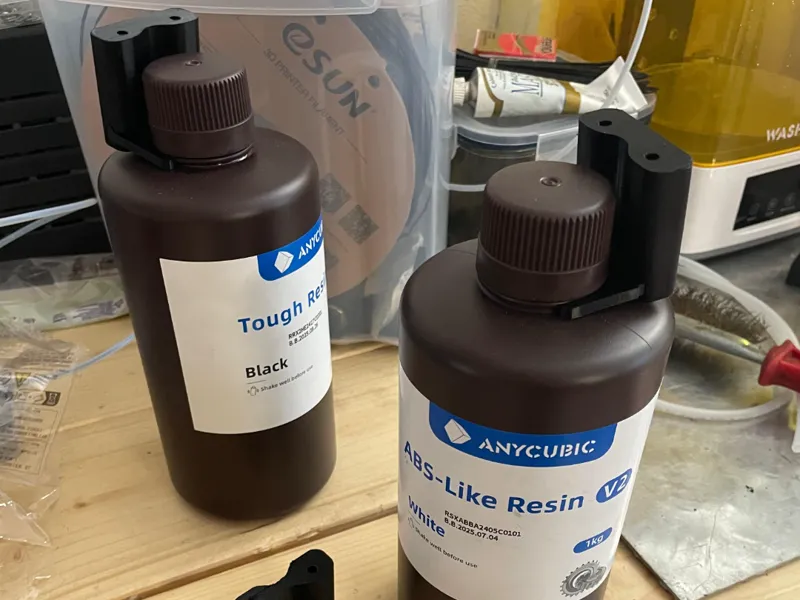 Vertical resin bottle hanger
