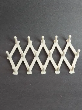 Figura decorativa: Miniature Accordian Peg Rack — vista de referencia 4
