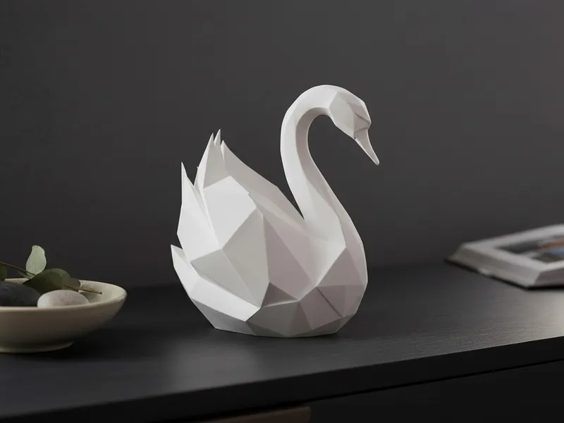 Graceful low poly swan sculpture