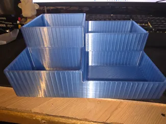 Simple four compartment desk/workshop organiser