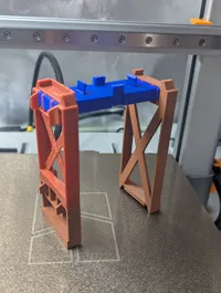 Supports and support beams to hold up raised tracks.