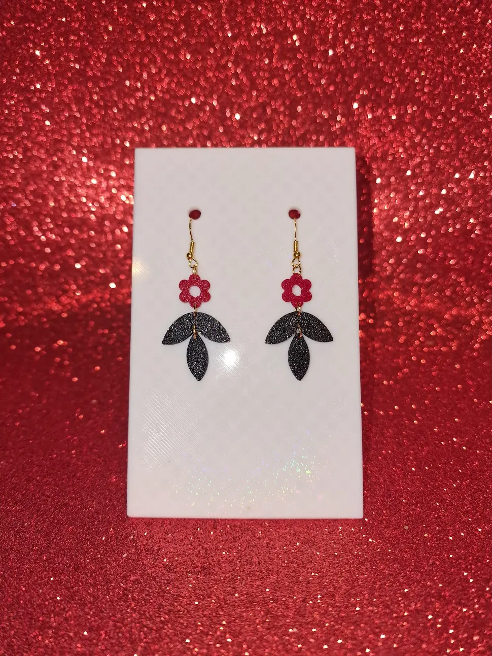 Red and black flower earrings view 2