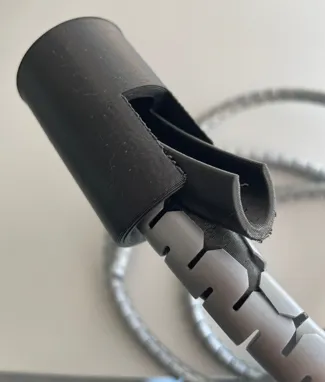 Cable management tool for spiral cable sleeves