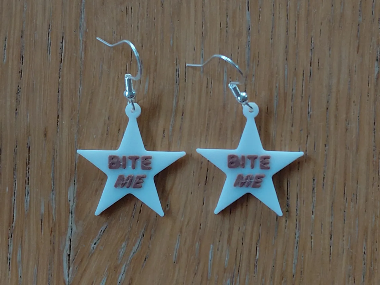 BITE ME Reneé Rap earrings / keychain view 3
