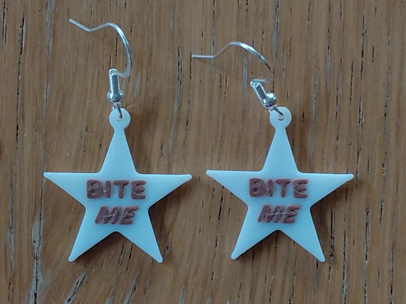 BITE ME Reneé Rap earrings / keychain