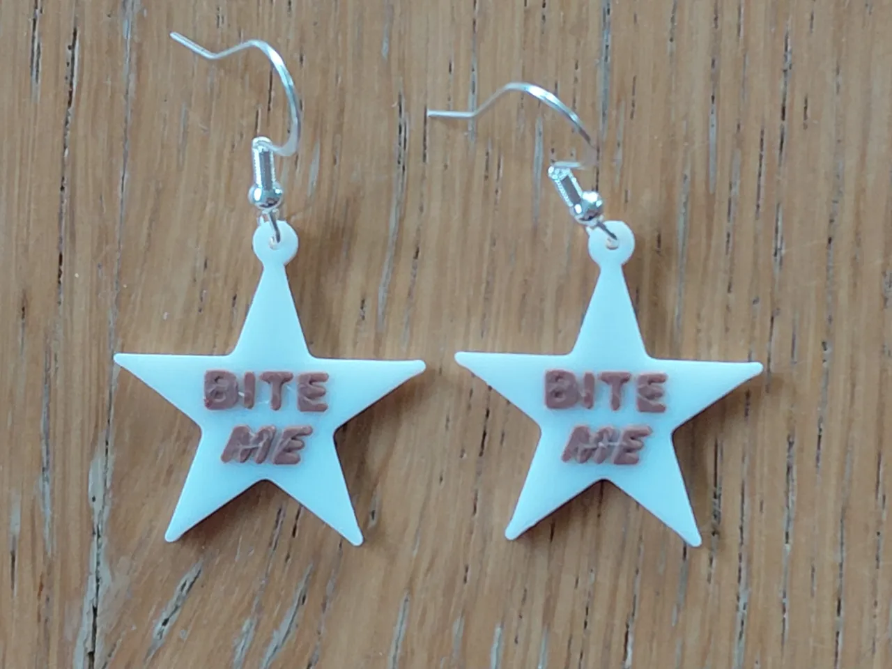 BITE ME Reneé Rap earrings / keychain view 2