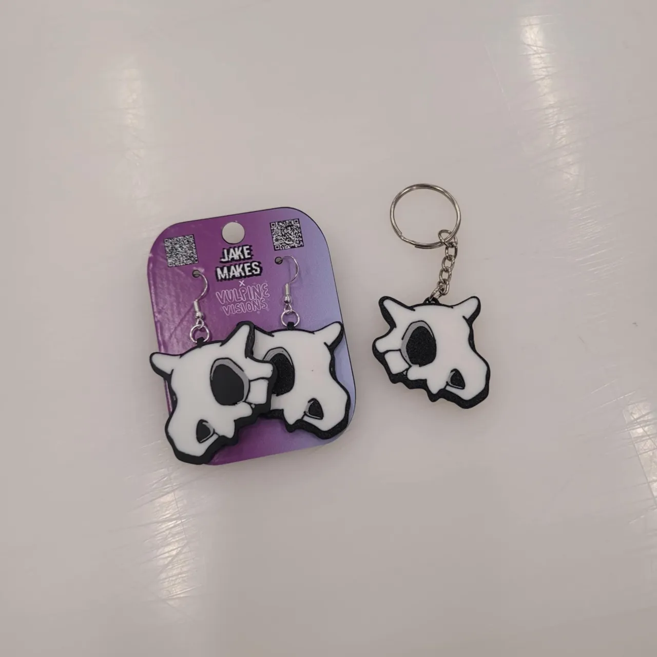 Cubone Keychain/Earrings view 2