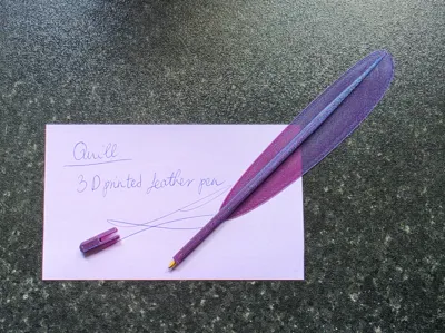 Quill - feather pen with BIC refill