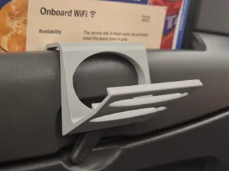 Airplane tray table phone holder