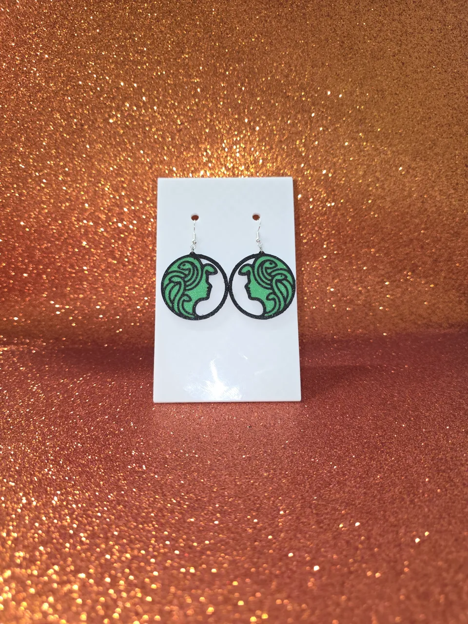 Medusa in a ring earrings view 2