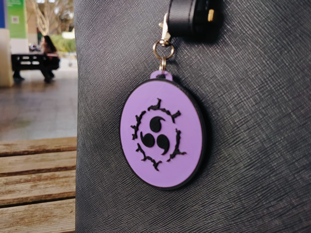 Sasuke Curse Mark keychain facedown