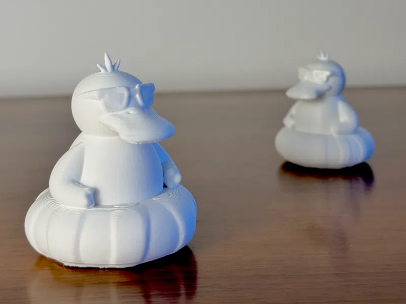 Psyduck Estivo - Statuetta 3D con ciambella 