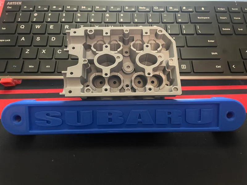 Subaru battery tie down