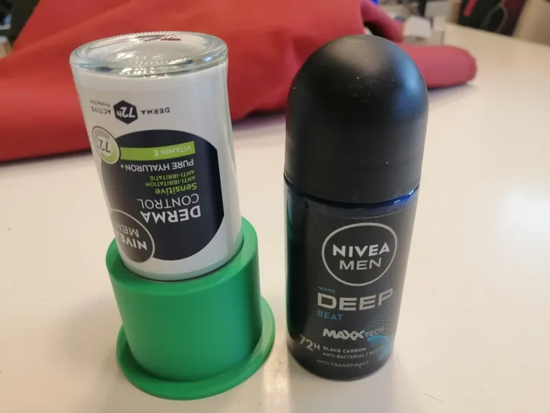 Deodorant holder, for bottles with round cap