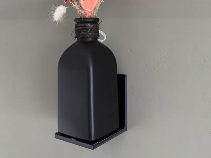 Wall mount for a vase