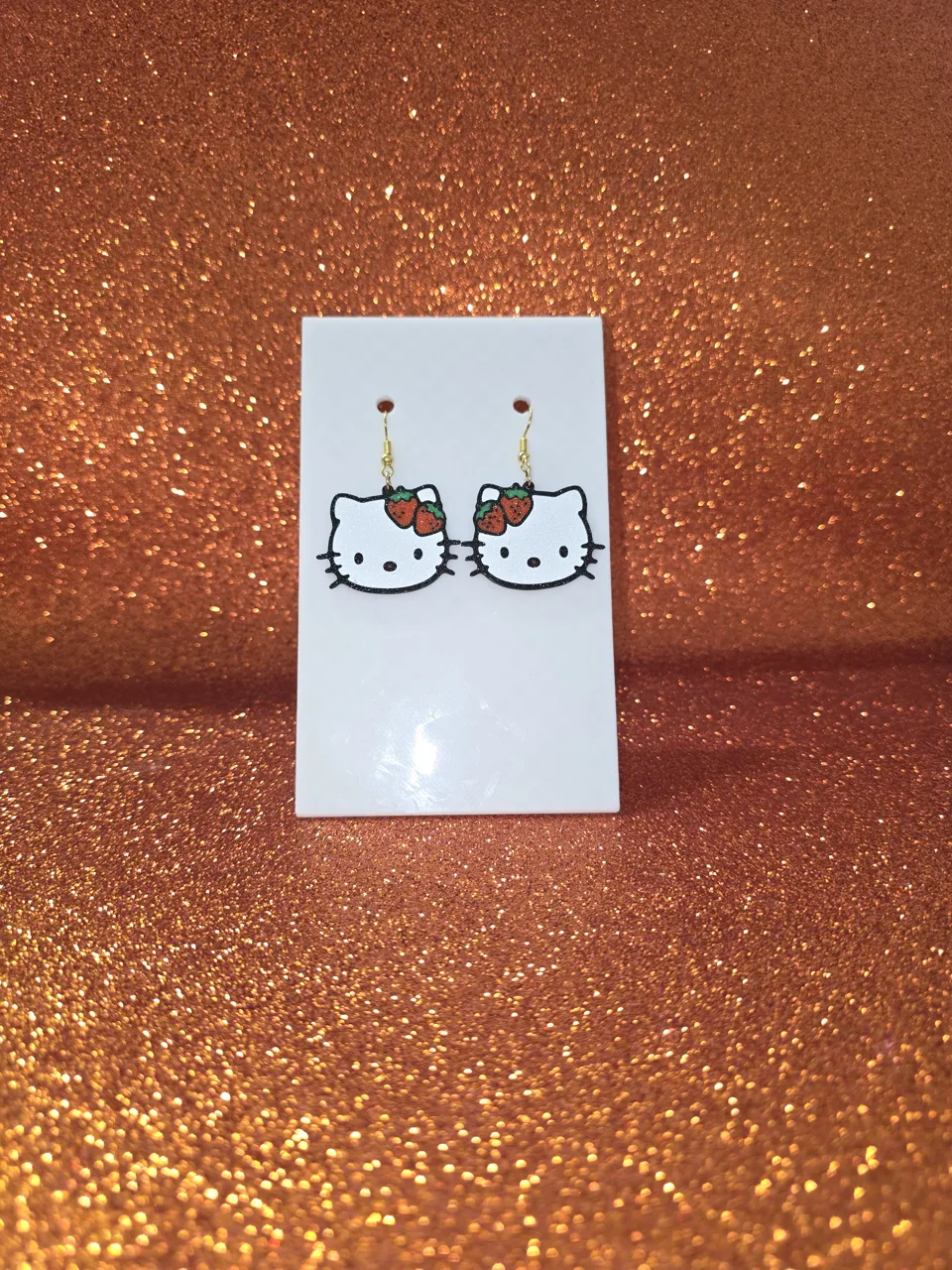 Hello Kitty strawberry earrings view 2
