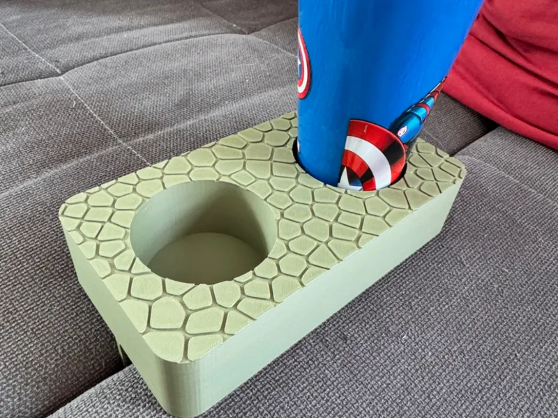 Cup holder for the gap between sofa cushions