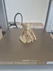 0.16mm layer, 3 walls, 15% infill. Tree support structure 25°