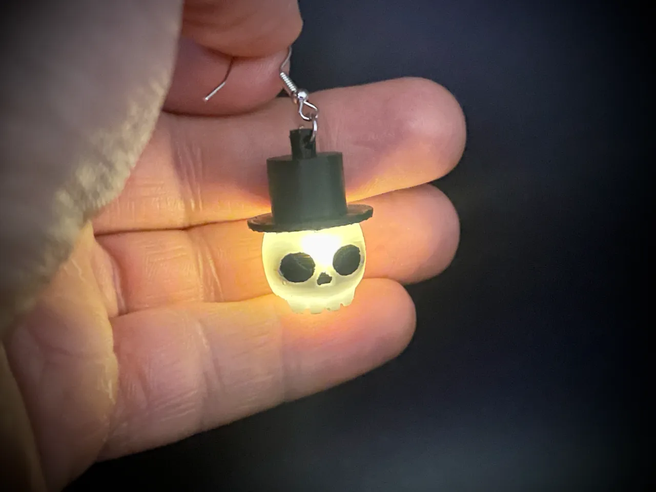 Halloween - cute glowing LED skull earring view 3