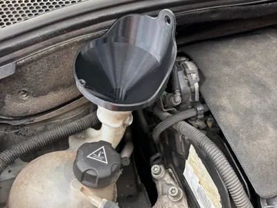 Funnel for windshield washer fluid